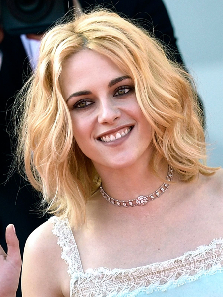 Kristen Stewart smiling with blonde hair